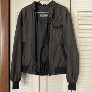 Vintage Members Only jacket with paint on sleeve